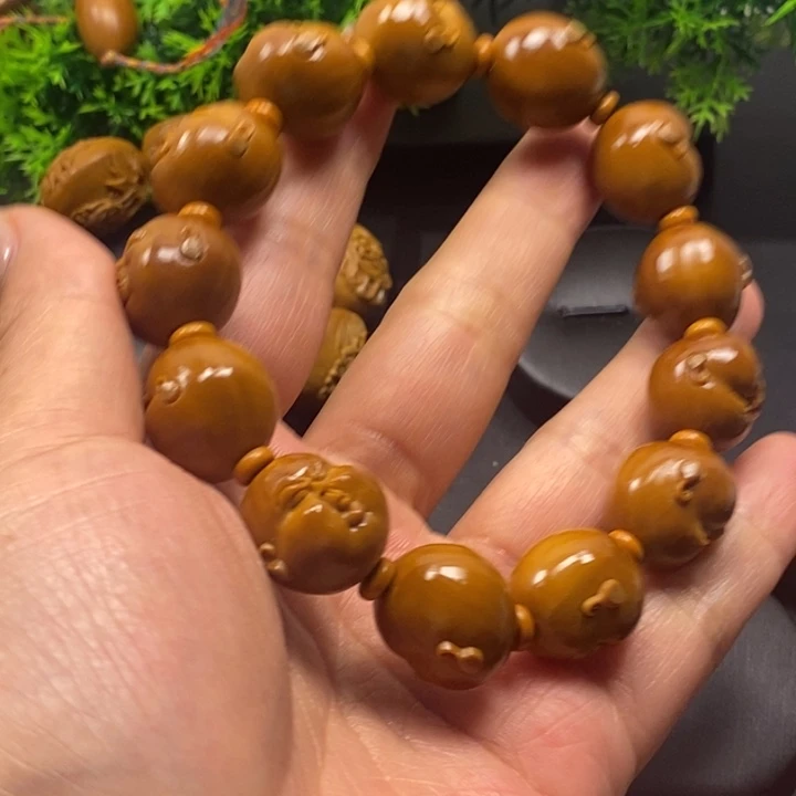 橄榄核手串人生百态