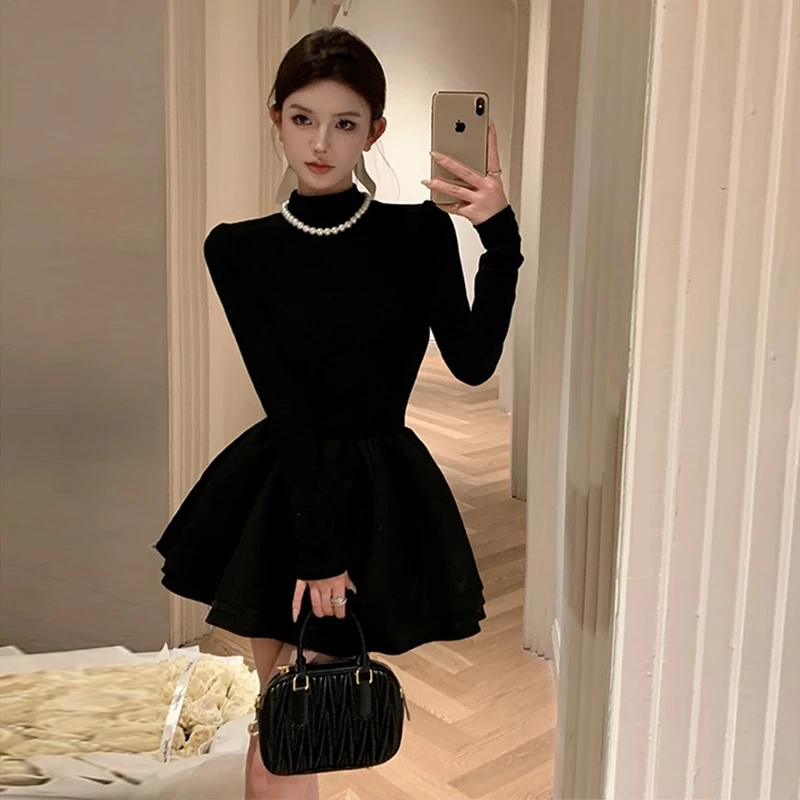 法式半高领黑色针织连衣裙女早秋收腰a字蓬蓬裙打底修身收腰短裙