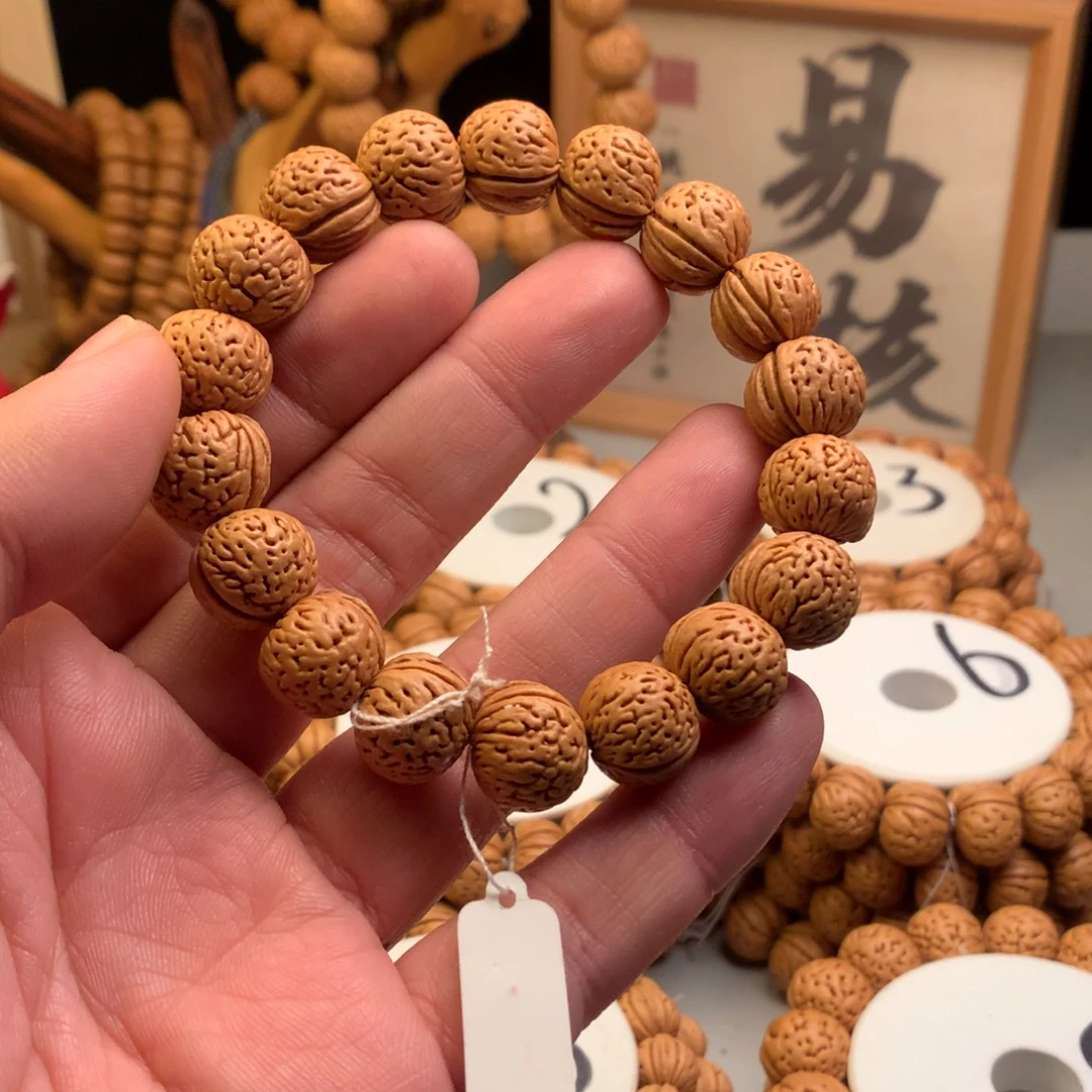 任***四桃核手串1.5南瓜手串