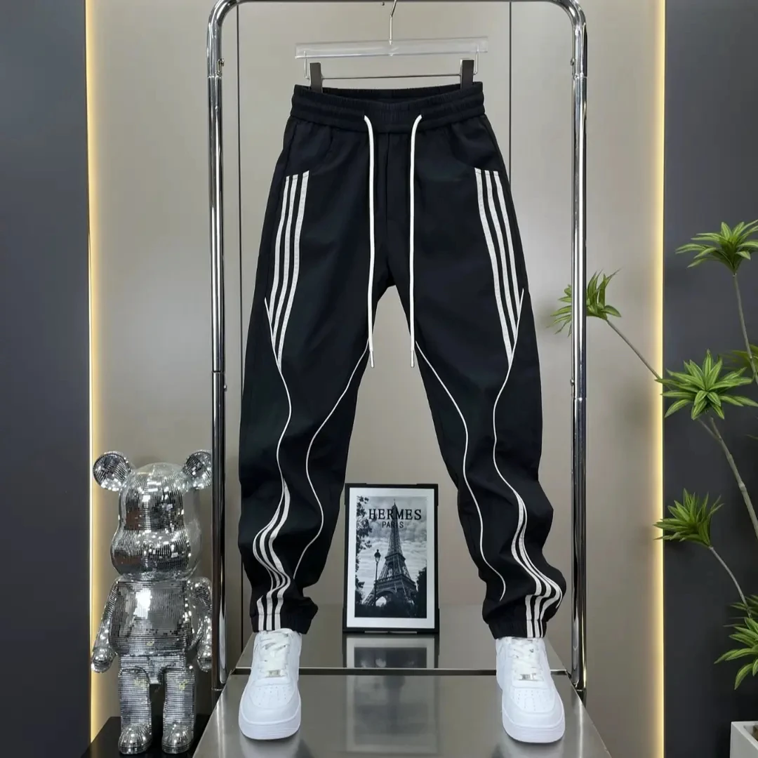 夏季拼接束脚裤潮条纹薄款冰凉休闲裤长裤男士裤子卫裤