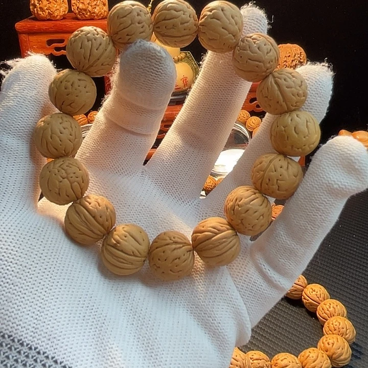 小****桃核手串盘锦小肌肉