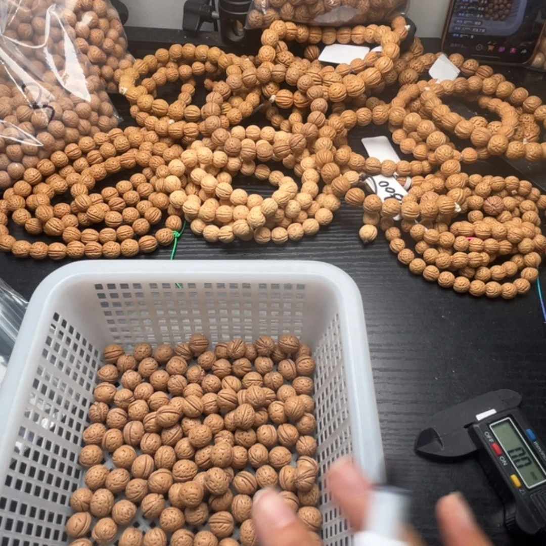 晓***年文玩核桃手串小桃核散籽批发