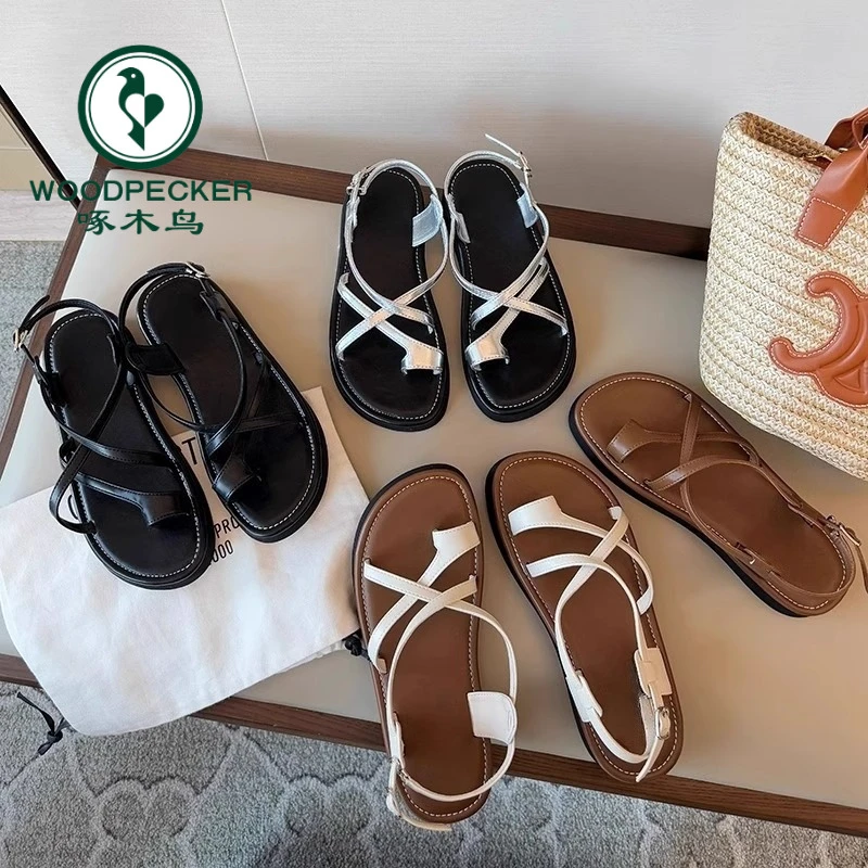 啄木鸟平底套趾凉鞋女2025夏款小众休闲度假沙滩鞋厚底罗马凉拖鞋