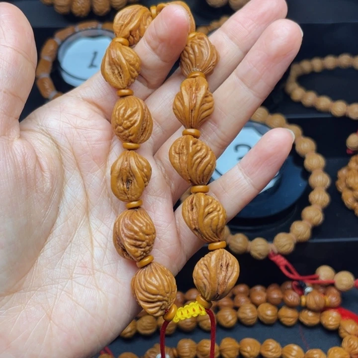 .***定吊坠桃核生命之源