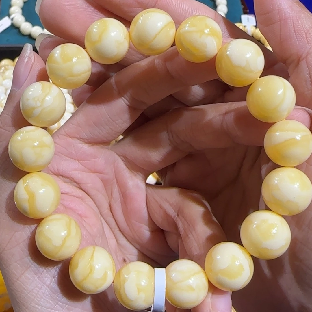 蜜蜡未镶嵌裸石13.6mm同料橘白飘花手串