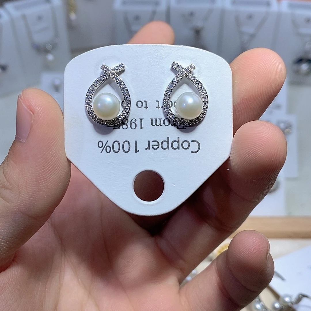 淡水珍珠银S925镶嵌耳饰