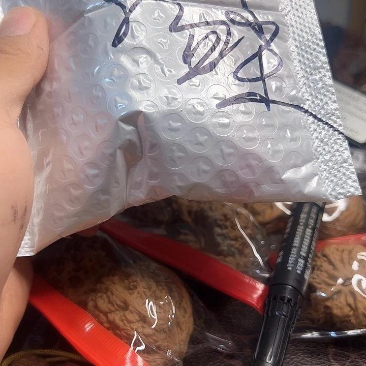 温***Ó桃核吊坠紫金鼠核桃