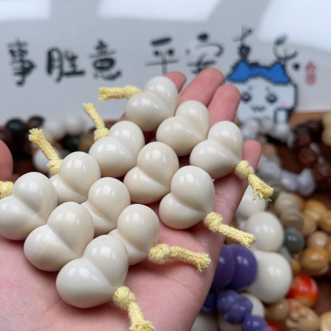 吊坠菩提根/象牙果T29-4爱心屁桃23-25瑕疵一串随机