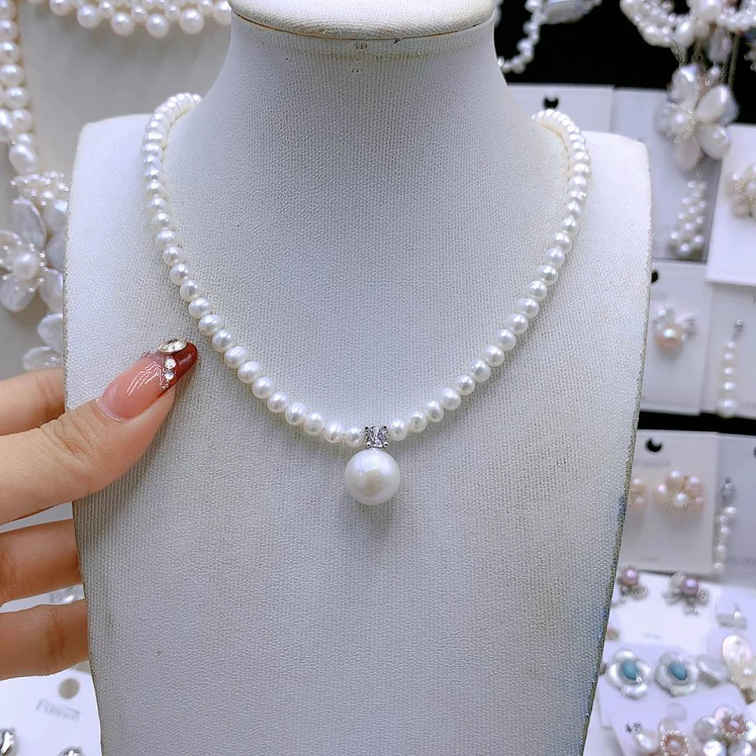 银S925镶嵌耳饰淡水珍珠圆***肉