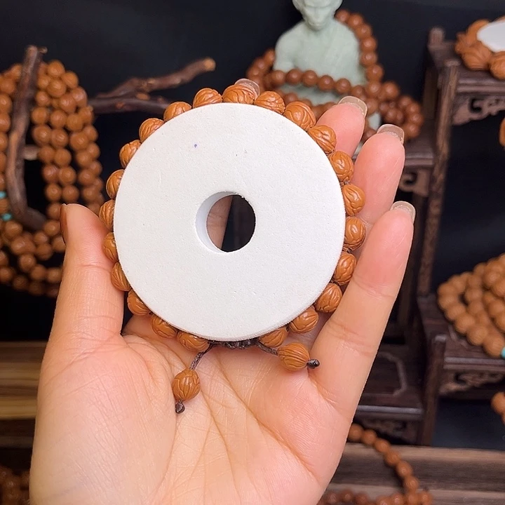 浅***~手串桃核小龙纹手串