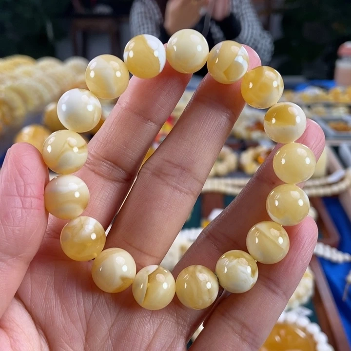琥珀未镶嵌珠宝奇石12+妖花溶洞圆珠16.87