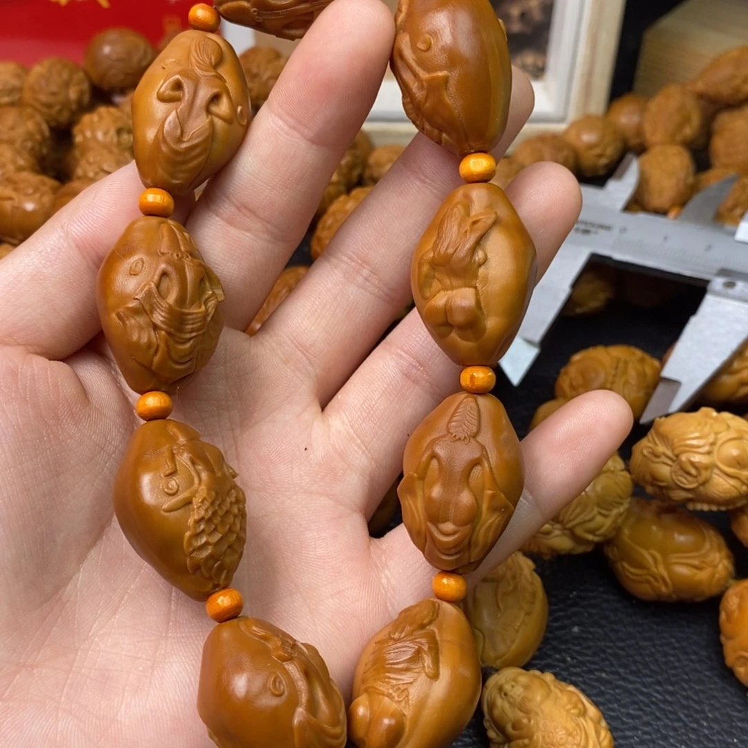 橄榄核吊坠橄榄核美女生命