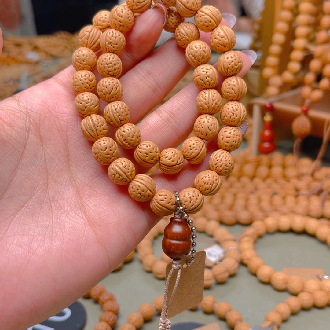 可***仔桃核吊坠桃核手持