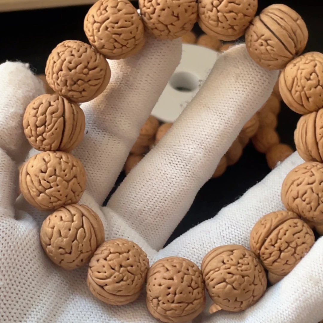 秋***水桃核手串虎皮肌肉纹