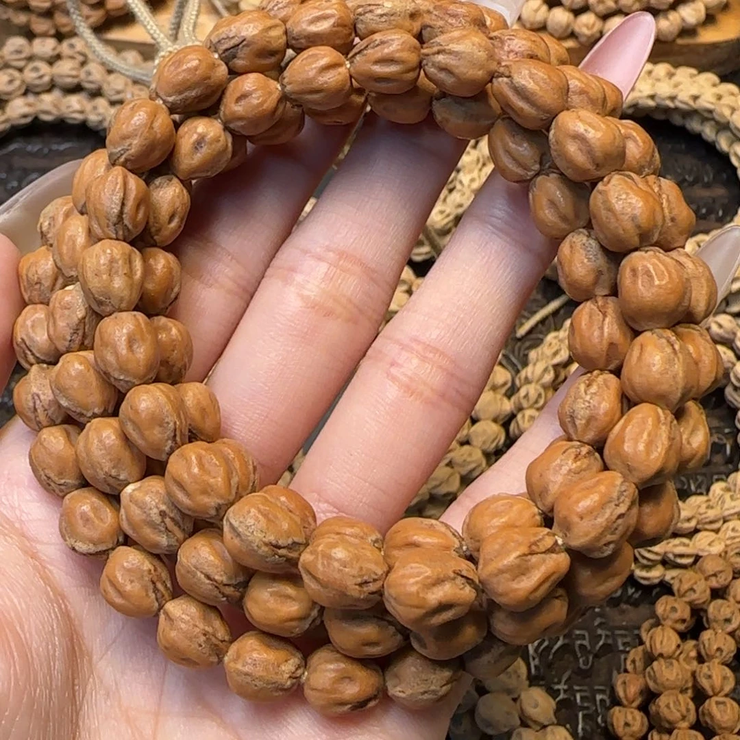 柏香籽/百香籽吊坠巴**年