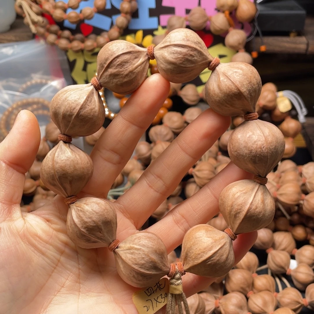 于***超橄榄核吊坠2730四花铁核