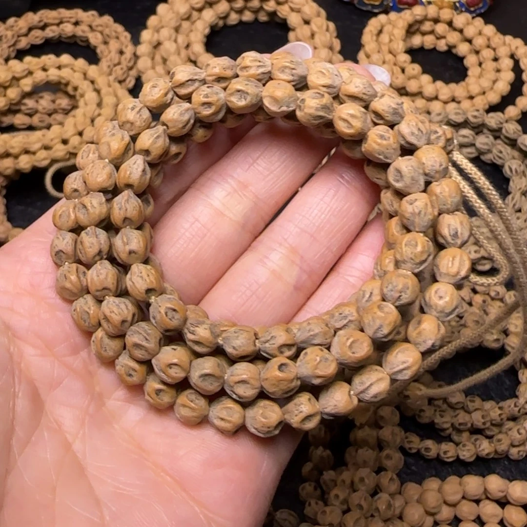 熊***子柏香籽/百香籽吊坠