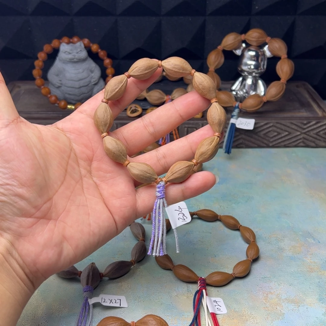 手串/手链橄榄核水晶核三面佛13*24小尺寸