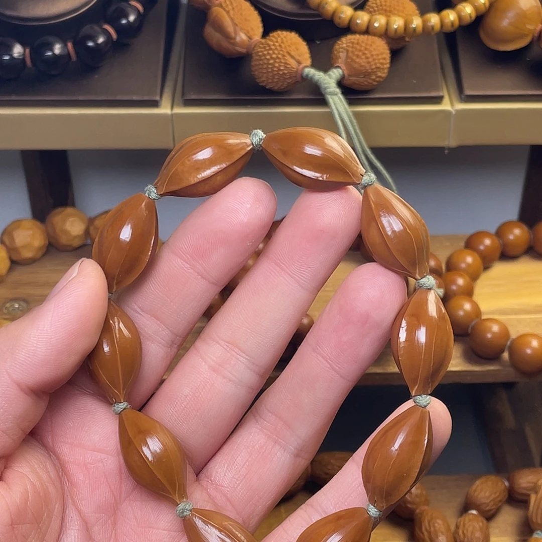 橘***゛橄榄核手串/手链1.4鲨鱼背