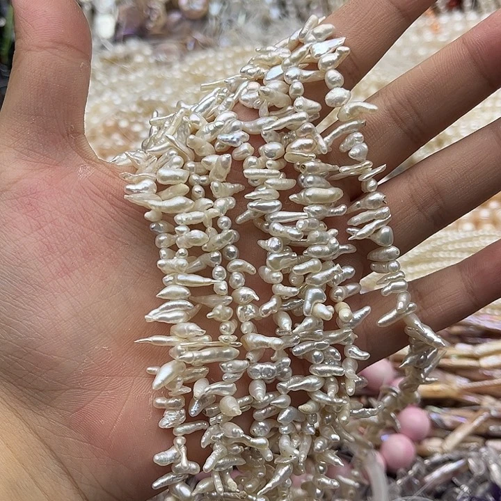 玛瑙/玉髓未镶嵌珠宝半成品一条侧孔长牙巴洛克珍珠