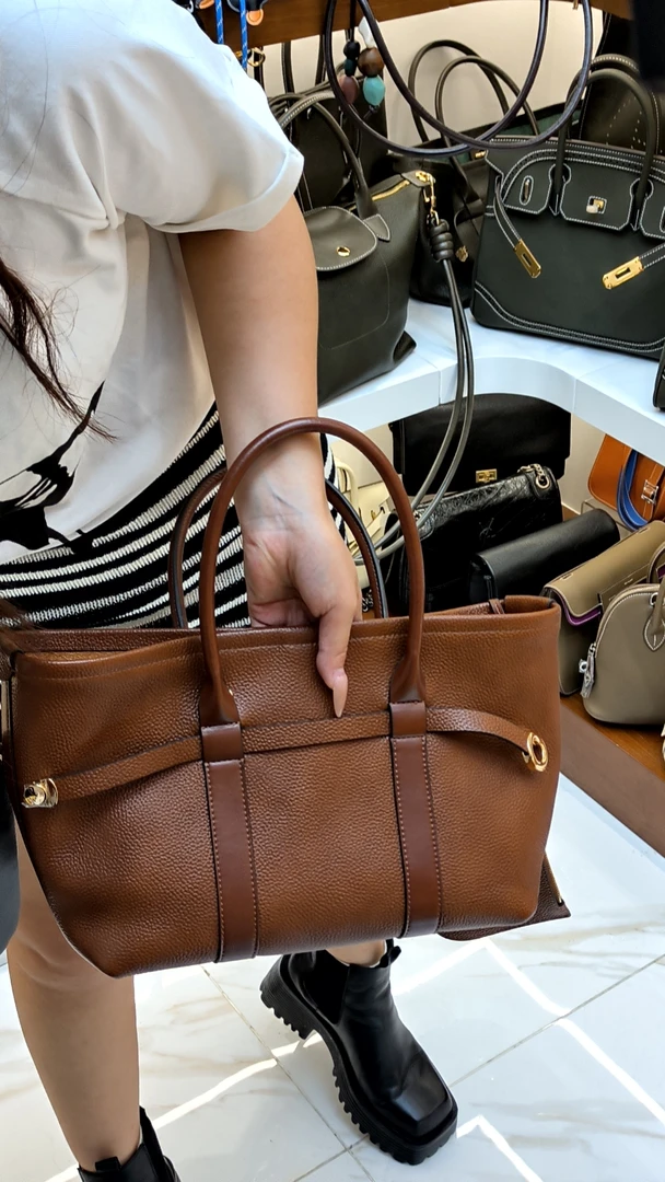 YUSHA/高档金棕色福宝马鞍皮19手提包-919908