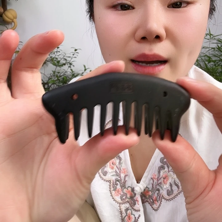 紫光檀微裂双排梳子不影响使用