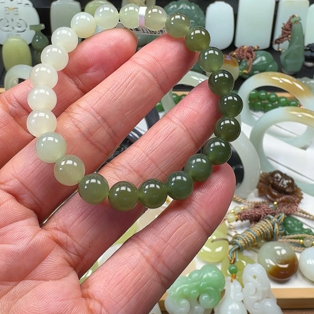 扬***鱼和田玉未镶嵌颈饰