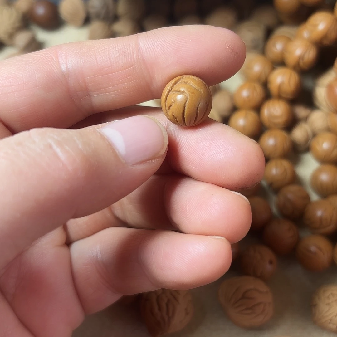 桃核吊坠宇*秦岭龙文光洙1.2尺18颗