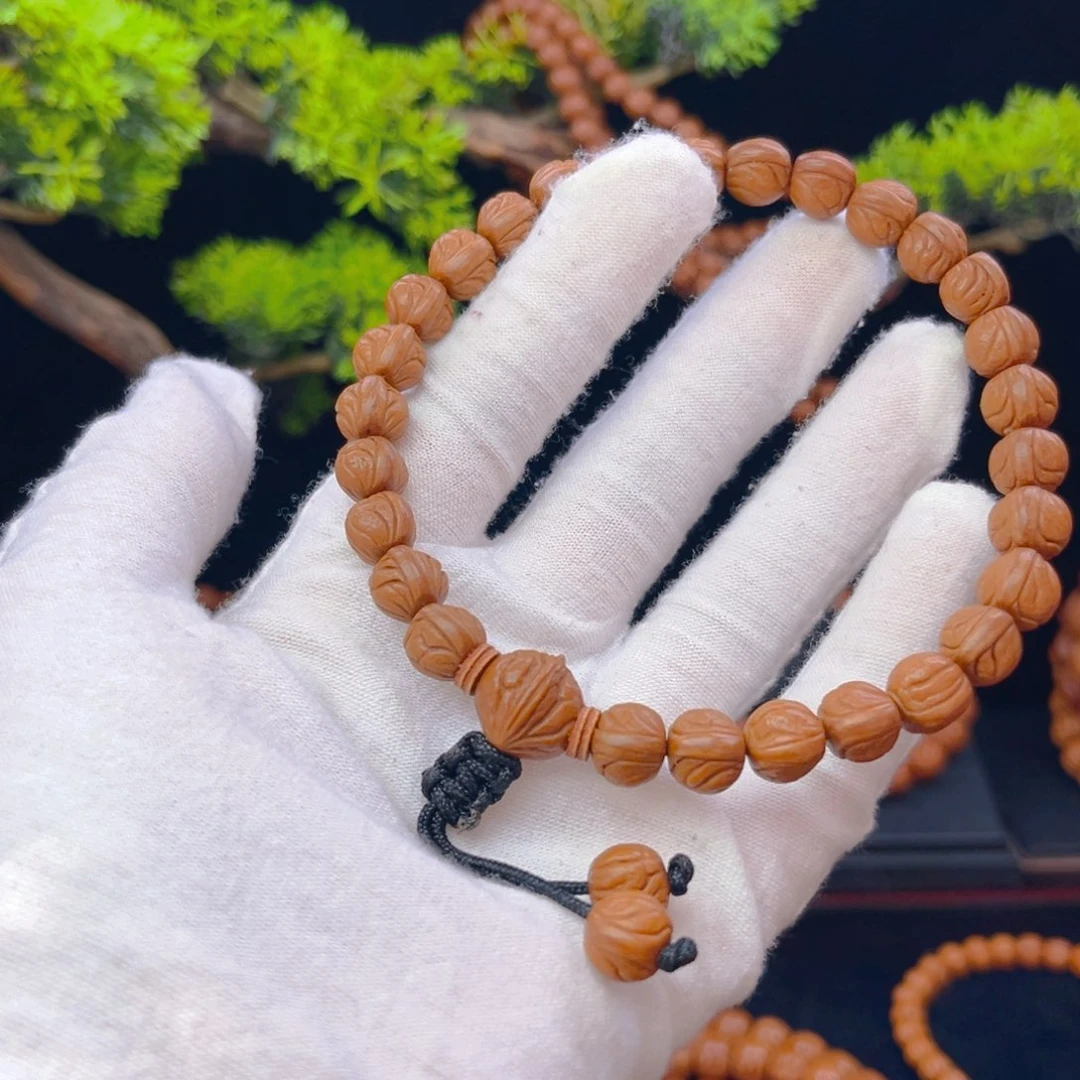 戴***伟吊坠桃核野生桃核