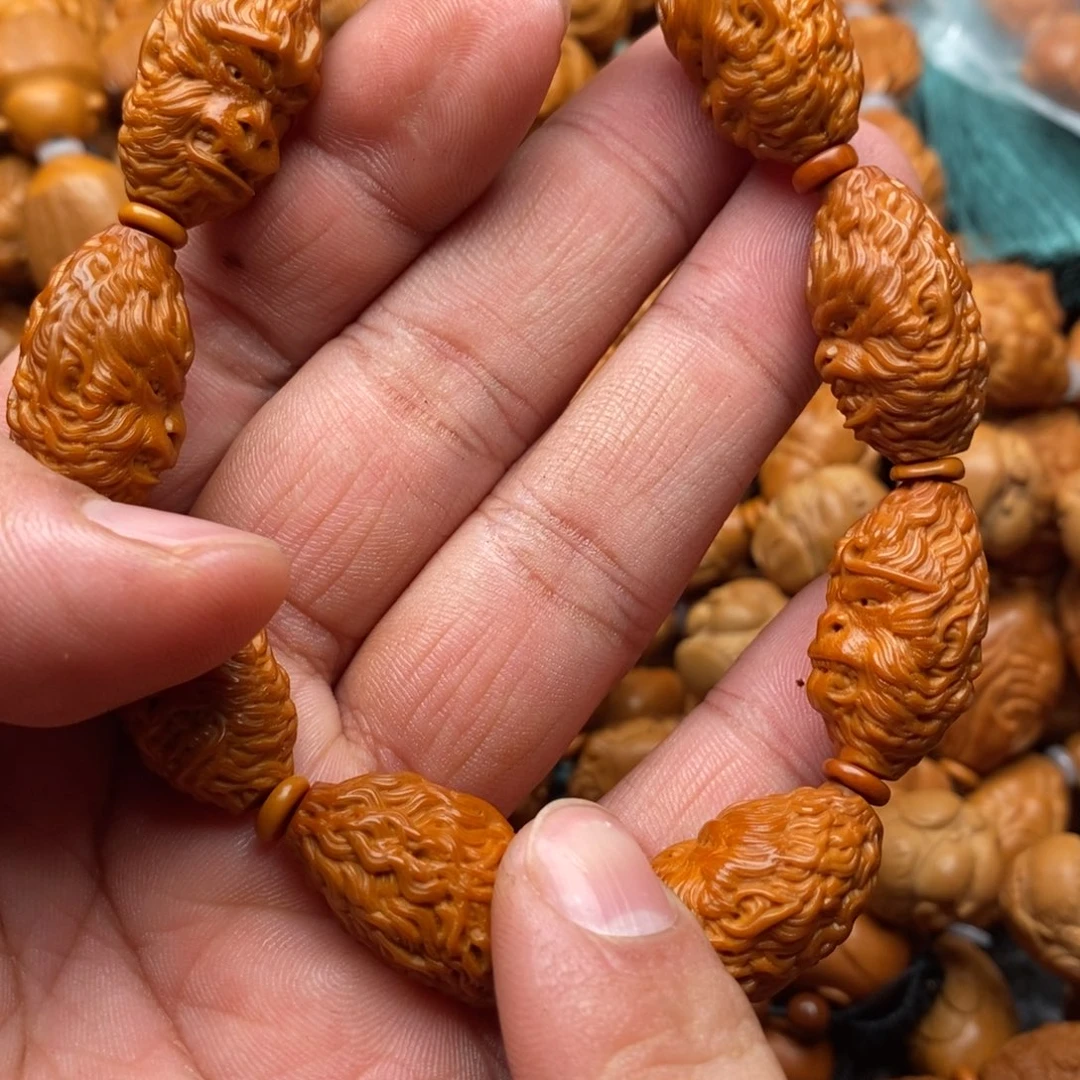 橄榄核手串亲爱得