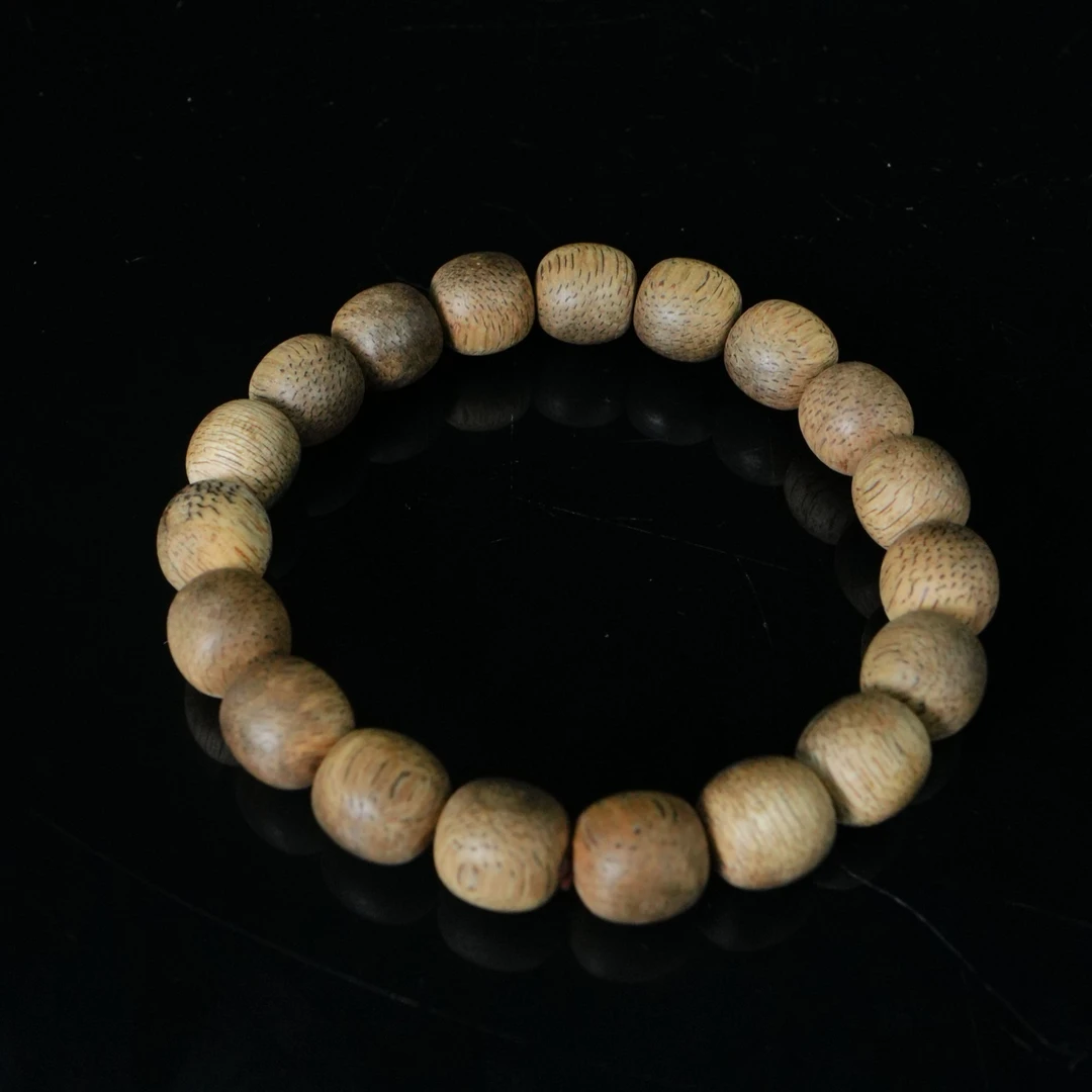 7675 东马沉香蛇皮纹桶珠手串 1.0x1.0cm 8.3g