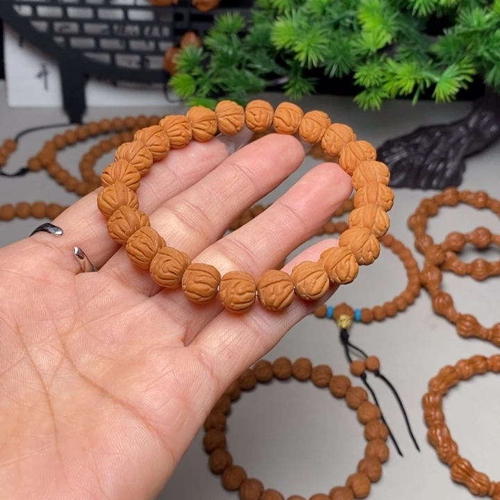 桃核手串凤羽手串