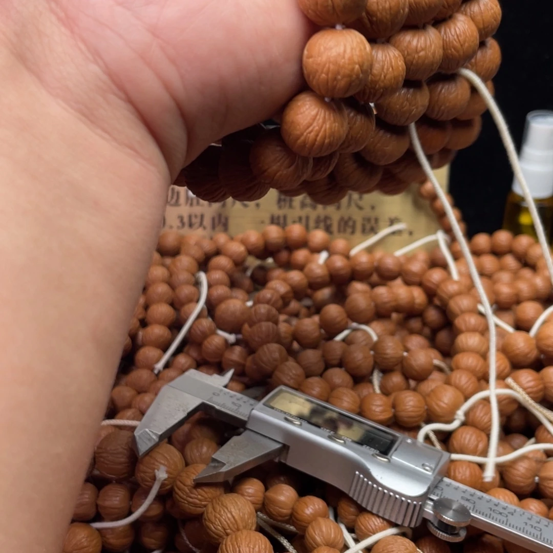 猴头核桃吊坠凤羽手持