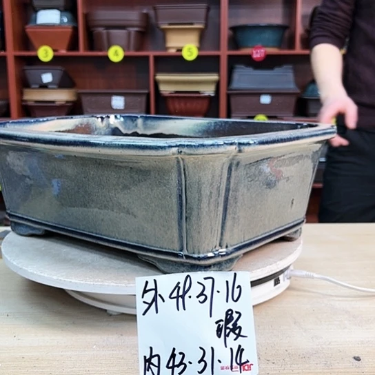 红陶晋***?紫砂花盆里都藏满