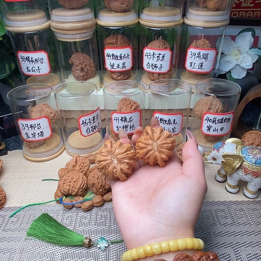 骐***宁文玩核桃把件白狮子……