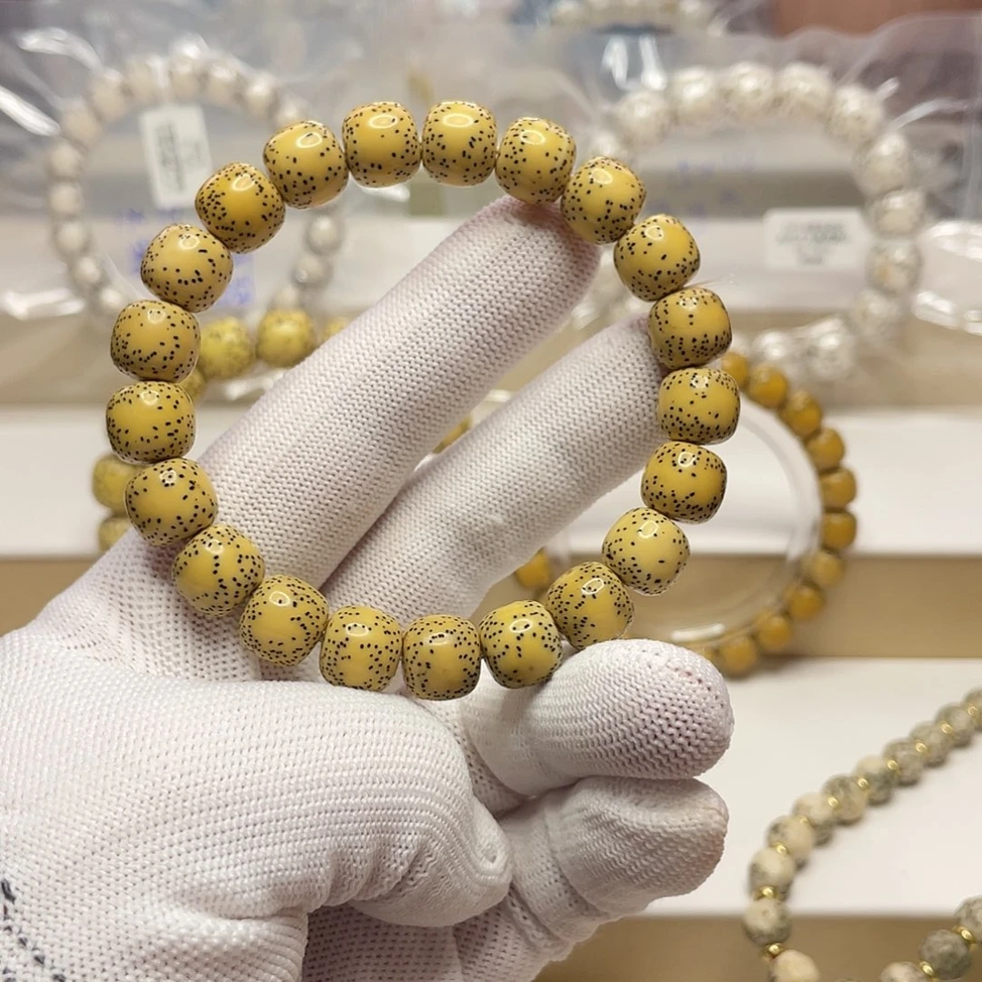 星月菩提吊坠11/10原生态大眼双留白鸡油黄单圈