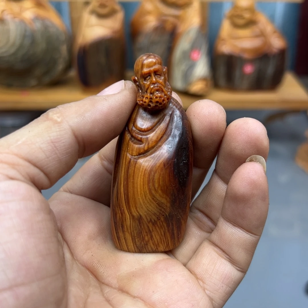 宽***士木崖柏木摆件手把件