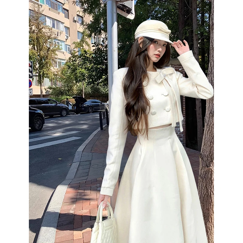 C-2884大码春季新款法式珍珠蝴蝶结排扣外套+半裙套装