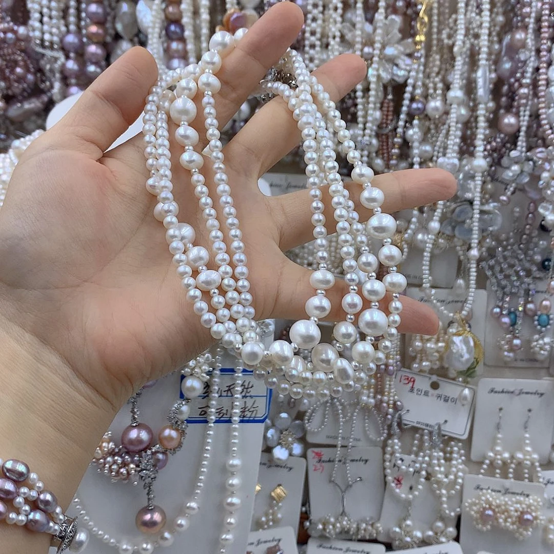 橙***沫银S925镶嵌淡水珍珠项链耳饰