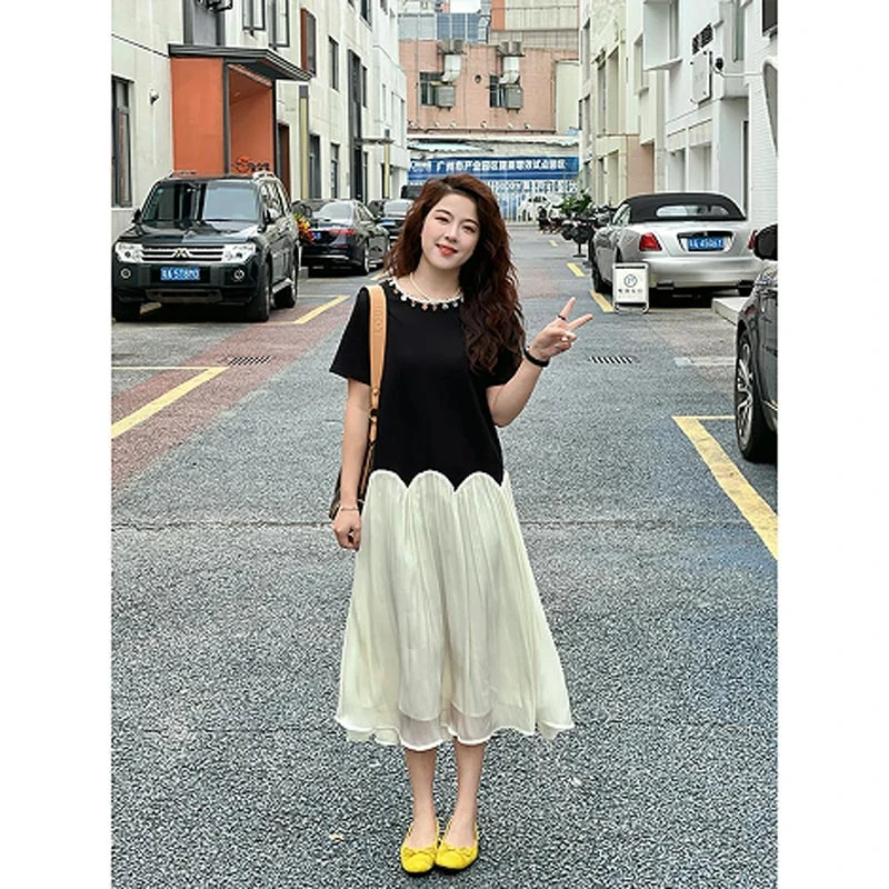 2025夏季韩式新款黑色泡泡袖拼接网纱收腰连衣裙女高级感小众裙子