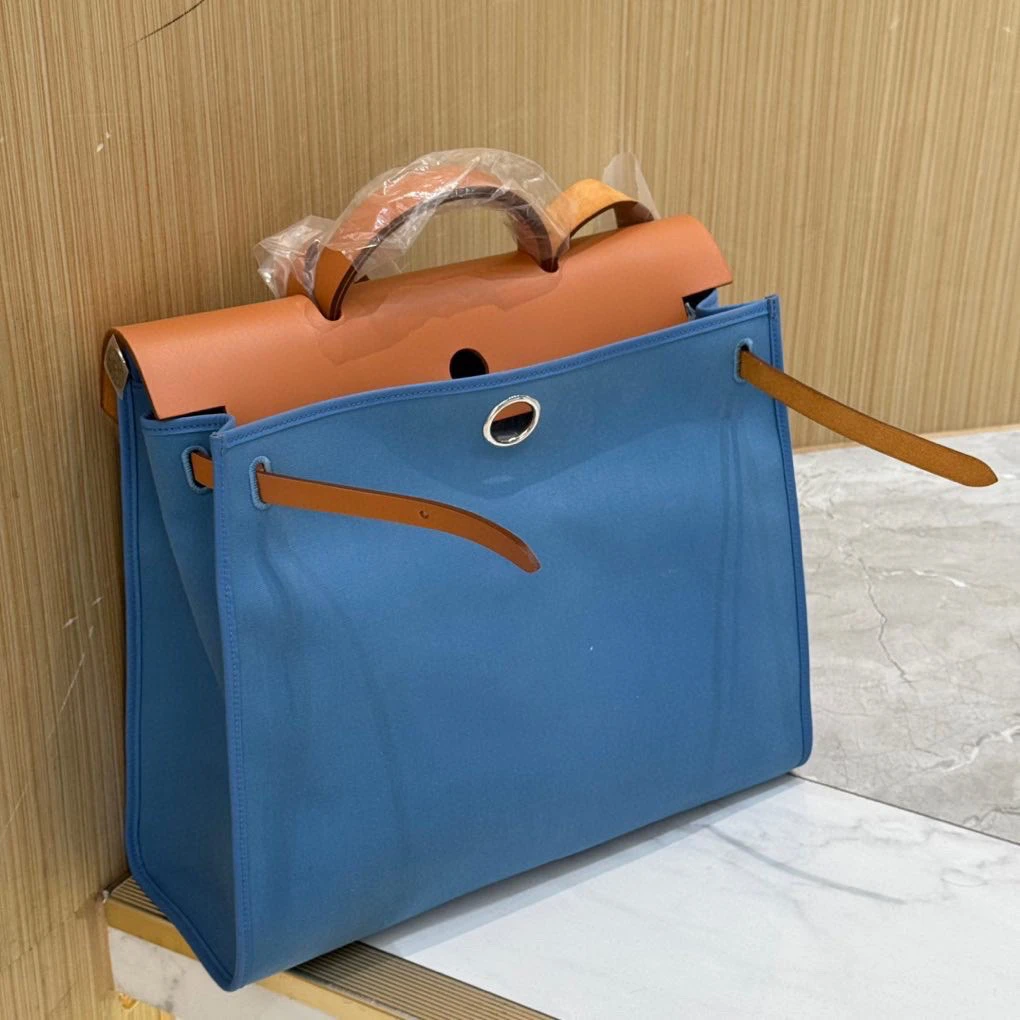 95新 Hermes/爱马仕 蓝棕herbag39单肩包  框O刻