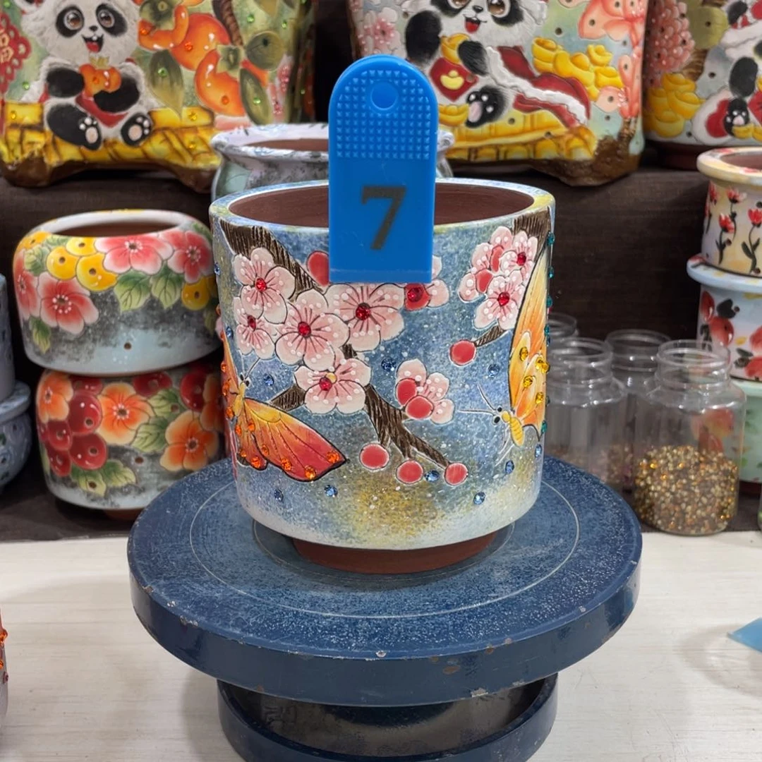 红陶✨****啊多肉花盆蝴蝶