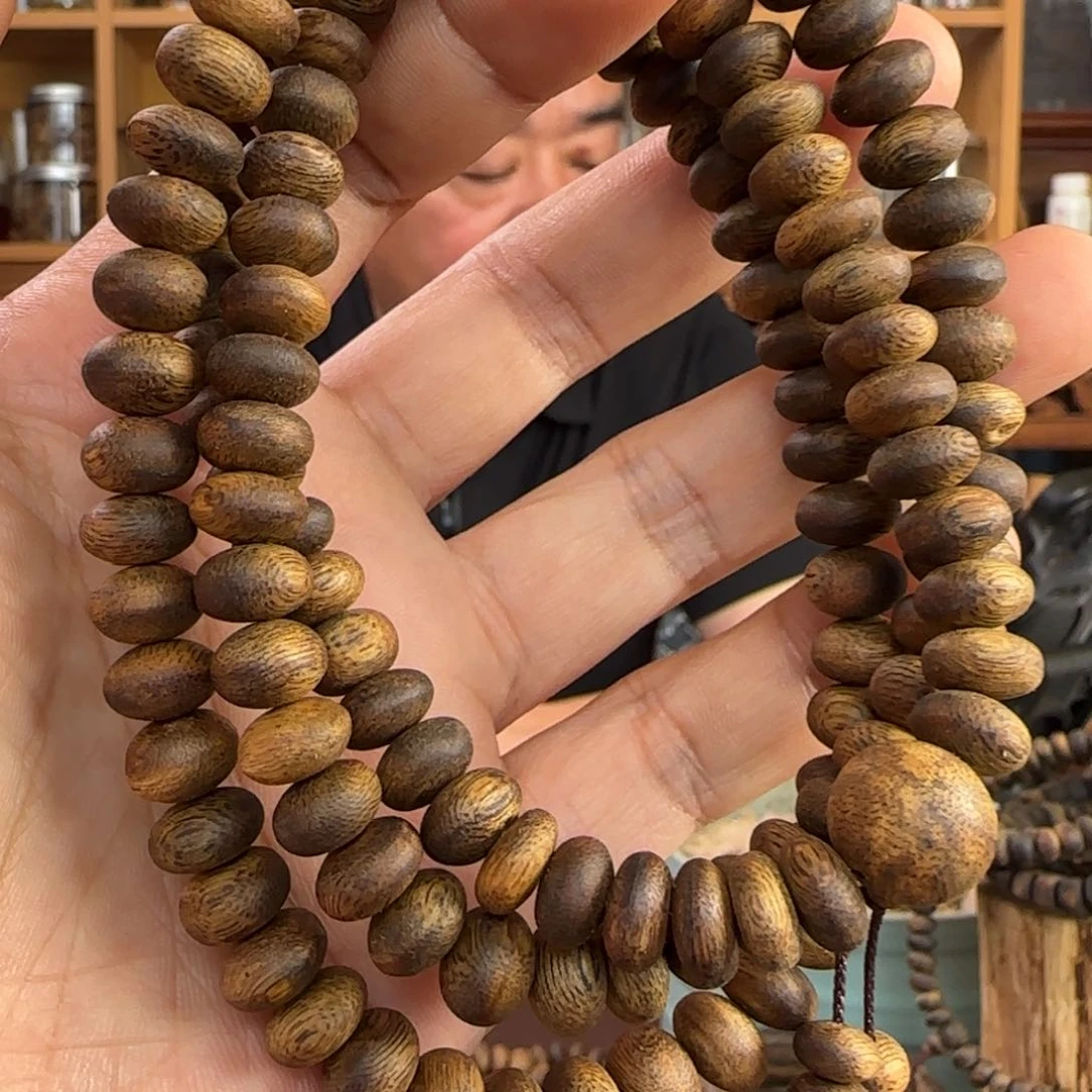 摆件沉香奇楠金沙叶算盘珠28克