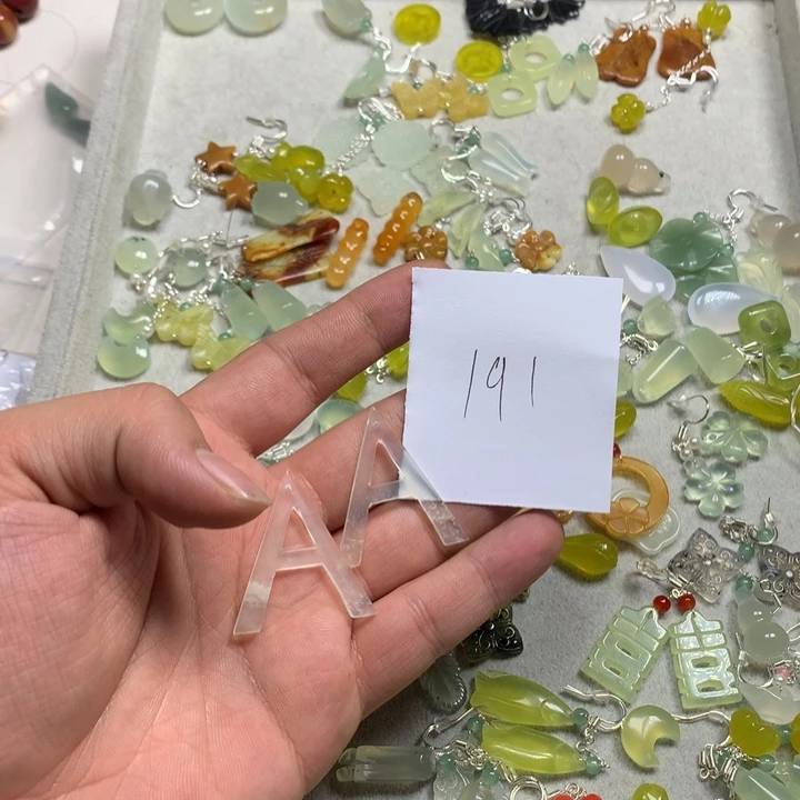 蕾***蕾蛇纹石玉合金耳钉