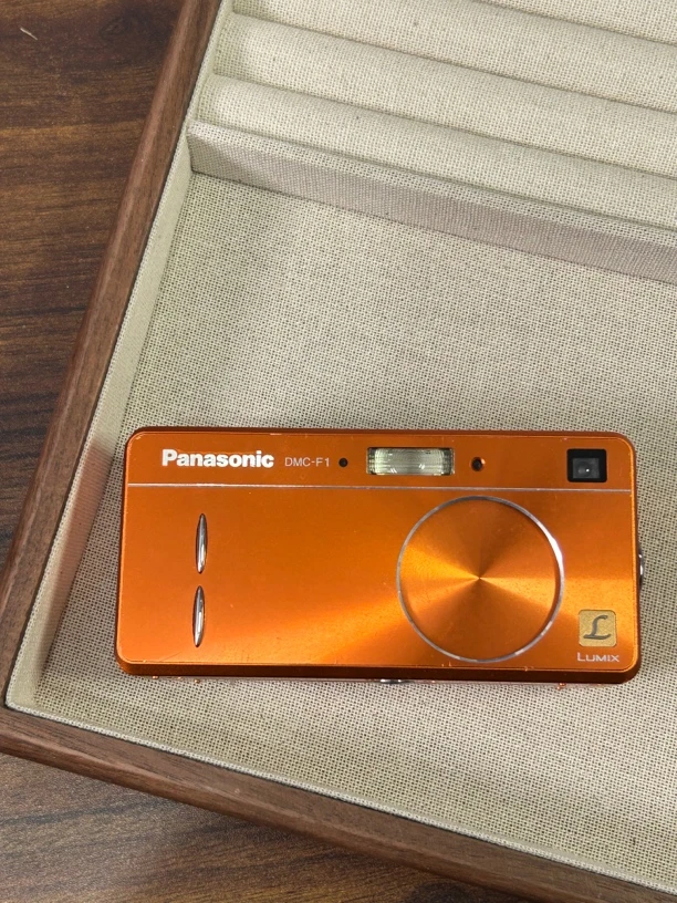 9新 Panasonic/松下 f1 橙色 小长条 复古ccd数码相机 日英文