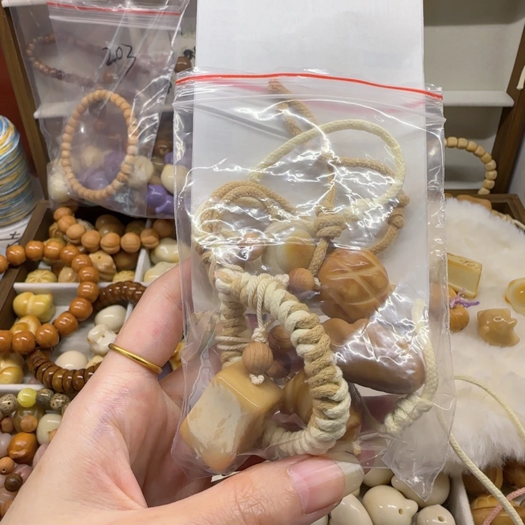 大****201 粉加紫的线包包挂