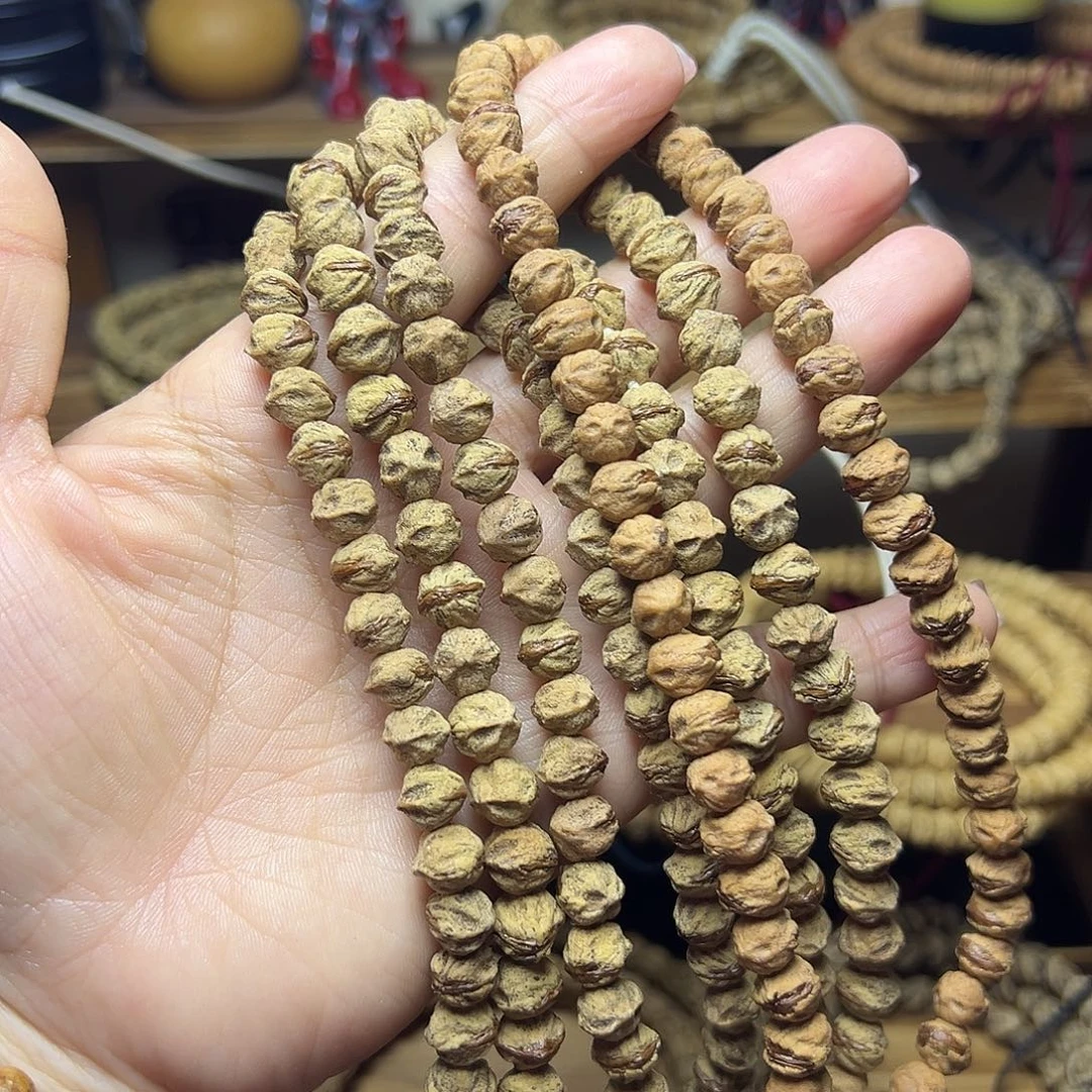 吊坠柏香籽/百香籽原桩横打红牙手持1条