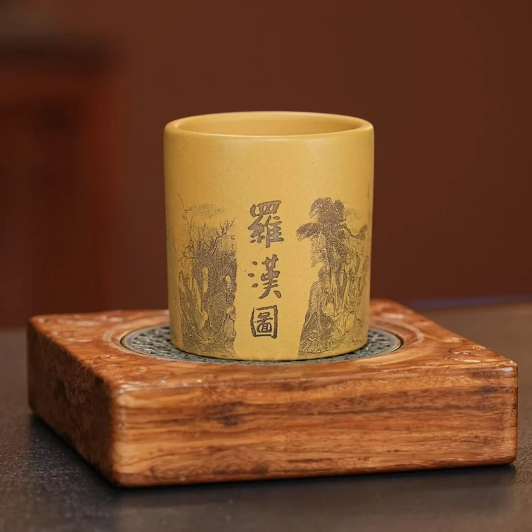 宜兴原矿黄金段刻绘罗汉图紫砂主人杯