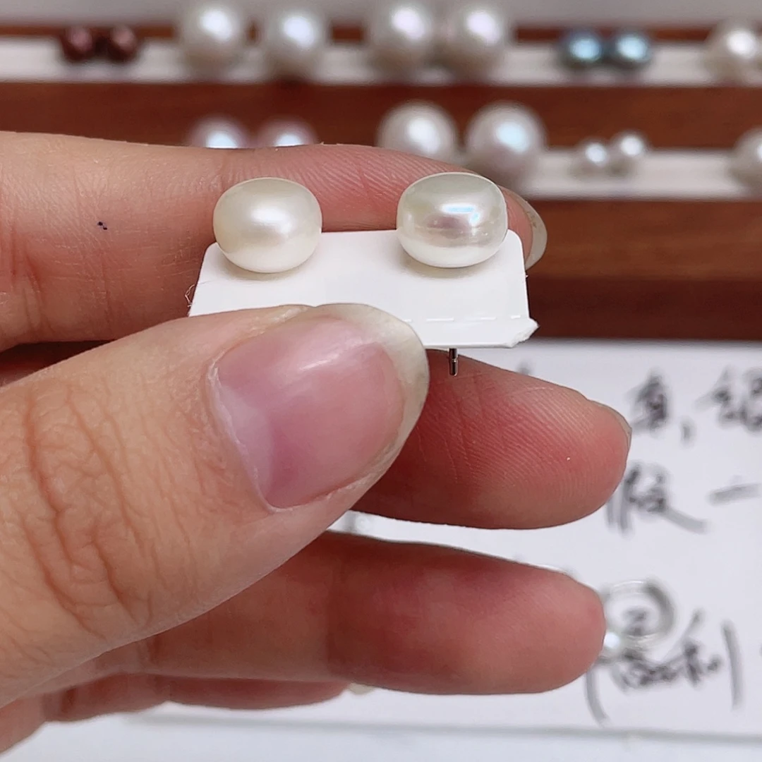 银S925镶嵌淡水珍珠耳饰江****?