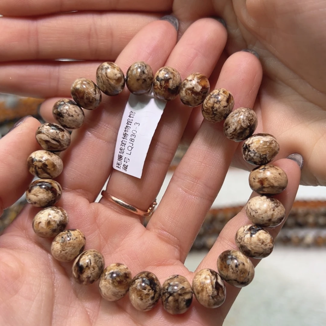 牛***）琥珀未镶嵌裸石抚顺琥珀干白花9m